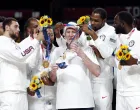 epaselect epa09403997 Kevin Durant (C-R) of USA puts the gold medal on his coach Gregg Popovich (C) during award ceremony after the Men's Basketball bronze medal match between Slovenia and Australia at the Tokyo 2020 Olympic Games at the Saitama Super Arena in Saitama, Japan, 07 August 2021. EPA/KIYOSHI OTA
