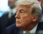U.S. President Donald Trump looks on, as he signs executive orders in the Oval Office at the White House in Washington, D.C., U.S., April 23, 2025. REUTERS/Leah Millis/Leah Millis