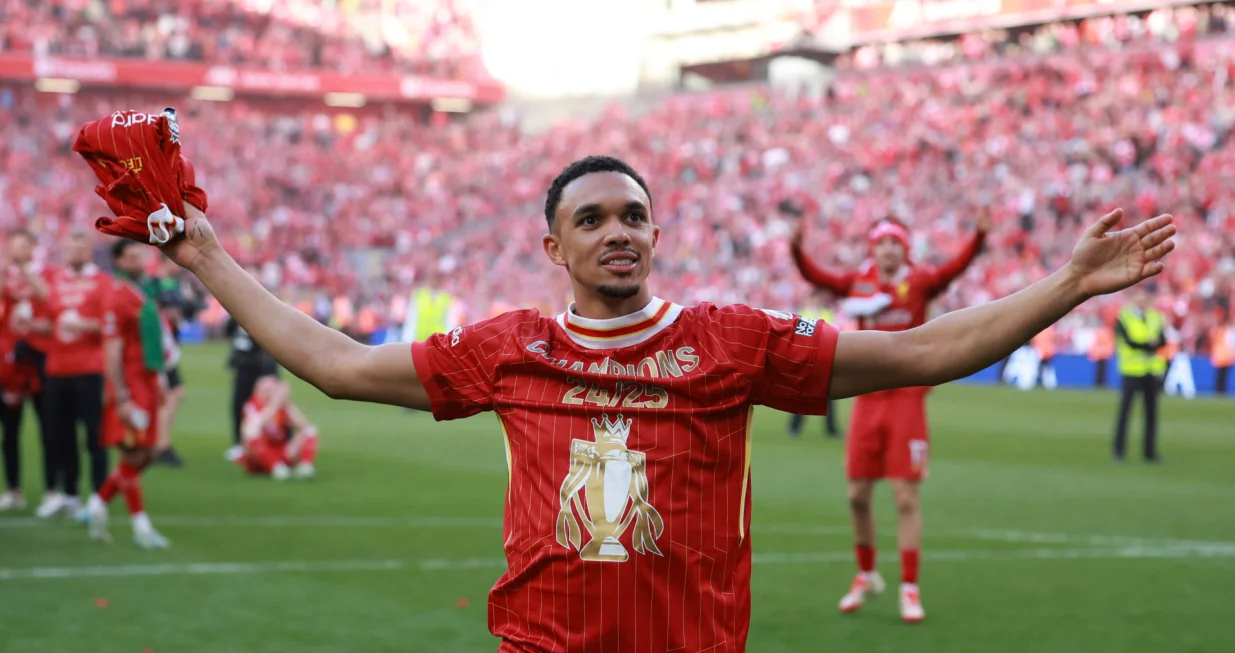 Soccer Football - Premier League - Liverpool v Tottenham Hotspur - Anfield, Liverpool, Britain - April 27, 2025 Liverpool's Trent Alexander-Arnold celebrates after winning the Premier League REUTERS/Phil Noble EDITORIAL USE ONLY. NO USE WITH UNAUTHORIZED AUDIO, VIDEO, DATA, FIXTURE LISTS, CLUB/LEAGUE LOGOS OR 'LIVE' SERVICES. ONLINE IN-MATCH USE LIMITED TO 120 IMAGES, NO VIDEO EMULATION. NO USE IN BETTING, GAMES OR SINGLE CLUB/LEAGUE/PLAYER PUBLICATIONS. PLEASE CONTACT YOUR ACCOUNT REPRESENTATIVE FOR FURTHER DETAILS..