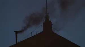 Black smoke rises from the chimney on the Sistine Chapel, indicating no decision has been made to elect a new pope, at the Vatican, May 7, 2025. REUTERS/Hannah McKay/Hannah Mckay