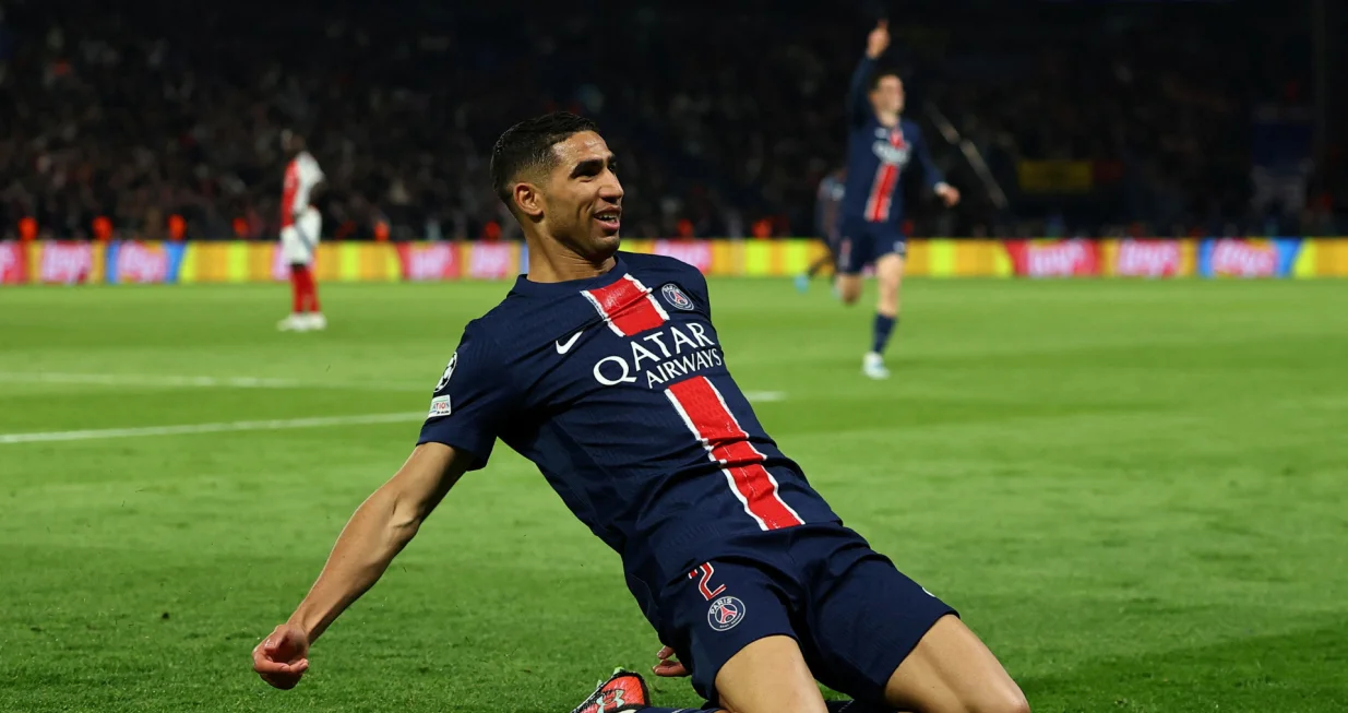 Soccer Football - Champions League - Semi Final - Second Leg - Paris St Germain v Arsenal - Parc des Princes, Paris, France - May 7, 2025 Paris St Germain's Achraf Hakimi celebrates scoring their second goal REUTERS/Gonzalo Fuentes TPX IMAGES OF THE DAY