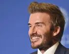 epa09852832 David Beckham, UNICEF Ambassador and Former Professional Footballer speaks during the Plenary Session of the final day of Doha Forum at the Sheraton Grand Doha Resort & Convention Hotel in Doha, Qatar, 27 March 2022. EPA/NOUSHAD THEKKAYIL