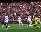 Soccer Football - LaLiga - FC Barcelona v Real Madrid - Estadi Olimpic Lluis Companys, Barcelona, Spain - May 11, 2025 FC Barcelona's Raphinha scores their fourth goal REUTERS/Albert Gea
