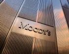 FILE PHOTO: Signage is seen outside the Moody's Corporation headquarters in Manhattan, New York, U.S., November 12, 2021. REUTERS/Andrew Kelly/File Photo/Andrew Kelly