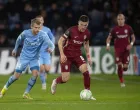 epa09603761 Daniel Graovac (C) of Cluj in action against Frederik Lauenborg (L) of Randers during the UEFA Europa Conference League soccer match between Randers FC and CFR Cluj in Randers, Denmark, 25 November 2021. EPA/Bo Amstrup DENMARK OUT