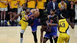 May 25, 2025; Indianapolis, Indiana, USA; New York Knicks guard Josh Hart (3) and Indiana Pacers forward Aaron Nesmith (23) battle for control of the ball during the fourth quarter of game three of the eastern conference finals for the 2025 NBA Playoffs at Gainbridge Fieldhouse. Mandatory Credit: Trevor Ruszkowski-Imagn Images