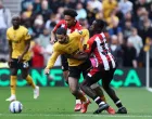Soccer Football - Premier League - Wolverhampton Wanderers v Brentford - Molineux Stadium, Wolverhampton, Britain - May 25, 2025 Wolverhampton Wanderers' Rayan Ait-Nouri in action with Brentford's Kevin Schade and Michael Kayode REUTERS/Isabel Infantes EDITORIAL USE ONLY. NO USE WITH UNAUTHORIZED AUDIO, VIDEO, DATA, FIXTURE LISTS, CLUB/LEAGUE LOGOS OR 'LIVE' SERVICES. ONLINE IN-MATCH USE LIMITED TO 120 IMAGES, NO VIDEO EMULATION. NO USE IN BETTING, GAMES OR SINGLE CLUB/LEAGUE/PLAYER PUBLICATIONS. PLEASE CONTACT YOUR ACCOUNT REPRESENTATIVE FOR FURTHER DETAILS..