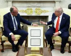 German Chancellor Friedrich Merz holds the birth certificate of U.S. President Donald Trump's grandfather during a meeting at the White House in Washington, D.C., U.S., June 5, 2025. REUTERS/Kevin Lamarque  TPX IMAGES OF THE DAY/Kevin Lamarque