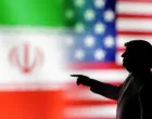 FILE PHOTO: A 3D-printed miniature model depicting U.S. President Donald Trump, Iranian and U.S. flags in this illustration taken, April 17, 2025. REUTERS/Dado Ruvic/Illustration/File Photo/Dado Ruvic