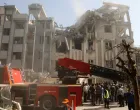 Rescuers work at the scene of a damaged building in the aftermath of Israeli strikes, in Tehran, Iran, June 13, 2025. Majid Asgaripour/WANA (West Asia News Agency) via REUTERS ATTENTION EDITORS - THIS PICTURE WAS PROVIDED BY A THIRD PARTY/Majid Asgaripour