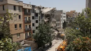 A building stands damaged in the aftermath of Israeli strikes, in Tehran, Iran, June 14, 2025. Majid Asgaripour/WANA (West Asia News Agency) via REUTERS ATTENTION EDITORS - THIS PICTURE WAS PROVIDED BY A THIRD PARTY.  TPX IMAGES OF THE DAY/Majid Asgaripour