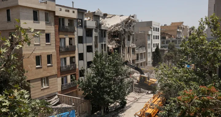 A building stands damaged in the aftermath of Israeli strikes, in Tehran, Iran, June 14, 2025. Majid Asgaripour/WANA (West Asia News Agency) via REUTERS ATTENTION EDITORS - THIS PICTURE WAS PROVIDED BY A THIRD PARTY. TPX IMAGES OF THE DAY/Majid Asgaripour