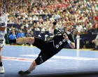 Handball - EHF Men's Handball Champions League - Semi Finals - Fuchse Berlin v HBC Nantes - Lanxess Arena, Cologne, Germany - June 14, 2025 Fuchse Berlin's Mijajlo Marsenic scores a goal REUTERS/Leon Kuegeler