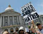 Protesters march through the streets during one of several nationwide "No Kings" protests against U.S. President Donald Trump in San Francisco, California, U.S. June 14, 2025. REUTERS/Daniel Dreifuss/Daniel Dreifuss