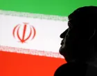 A 3D printed miniature model of U.S. President Donald Trump and Iran flag are seen in this illustration taken June 18, 2025. REUTERS/Dado Ruvic/Illustration/Dado Ruvic