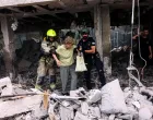 First responders gather at an impact site following Iran's strike on Israel, amid the Iran-Israel conflict, in Haifa, Israel, June 22, 2025. REUTERS/Florion Goga/Florion Goga