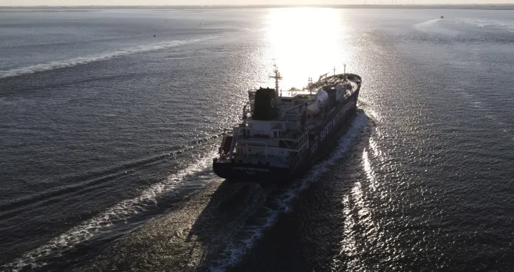 epa10116383 An aerial picture taken with a drone shows JS Ineos Innovatio (IMO Number 9744958) a LNG liquefied natural gas tanker on the Schelde River after leaving Antwerp harbour, Belgium, 11 August 2022, in direction of Rotterdam. EPA/OLIVIER HOSLET/Olivier Hoslet