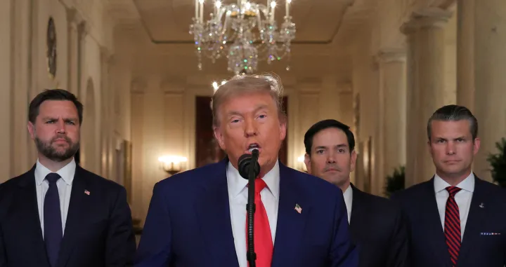 FILE PHOTO: U.S. President Donald Trump delivers an address to the nation accompanied by U.S. Vice President JD Vance, U.S. Secretary of State Marco Rubio and U.S. Defense Secretary Pete Hegseth, at the White House in Washington, D.C., U.S. June 21, 2025, following U.S. strikes on Iran's nuclear facilities. REUTERS/Carlos Barria/Pool/File Photo/Carlos Barria