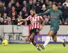 epa10386635 Bryan Mbeumo (L) of Brentford in action against Virgil van Dijk (R) of Liverpool during the English Premier League soccer match between Brentford FC and Liverpool FC in Brentford, Britain, 02 January 2023. EPA/Kieran Galvin EDITORIAL USE ONLY. No use with unauthorized audio, video, data, fixture lists, club/league logos or 'live' services. Online in-match use limited to 120 images, no video emulation. No use in betting, games or single club/league/player publications