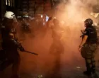 Law enforcement officers operate during an anti-government protest demanding snap elections, in Belgrade, Serbia, June 28, 2025. REUTERS/Marko Djurica/Marko Djurica