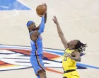Jun 22, 2025; Oklahoma City, Oklahoma, USA; Oklahoma City Thunder guard Shai Gilgeous-Alexander (2) shoots the ball againstIndiana Pacers forward Aaron Nesmith (23) during the first half of game seven of the 2025 NBA Finals at Paycom Center. Mandatory Credit: Alonzo Adams-Imagn Images