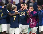epa10366348 Theo Hernandez (C) of France and teammates celebrate after winning the FIFA World Cup 2022 semi final between France and Morocco at Al Bayt Stadium in Al Khor, Qatar, 14 December 2022. EPA/Georgi Licovski