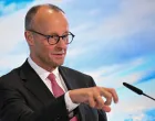 German Chancellor Friedrich Merz attends a press conference following a Bavarian state cabinet meeting on Germany's highest mountain, the Zugspitze, near Garmisch-Partenkirchen, Germany, July 15, 2025. REUTERS/Angelika Warmuth/Angelika Warmuth