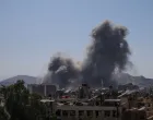 Smoke rises after Israeli strikes on Syria's defense ministry in Damascus, according to Al Jazeera TV, in Damascus, Syria July 16, 2025. REUTERS/Khalil Ashawi/Khalil Ashawi