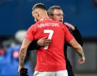 epa10316905 Austria head coach Ralf Rangnick (R) hugs Marko Arnautovic of Austria during the international friendly soccer match between Austria and Italy in Vienna, Austria, 20 November 2022. EPA/CHRISTIAN BRUNA