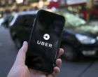 epa09023553 (FILE) - An Uber logo on a mobile telephone in central London, Britain, 22 September 2017 (re-issued 19 February 2021). The UK Supreme Court on 19 February 2021 ruled the Uber drivers are not not self-employed but workers. Uber, that has some 45,000 drivers working in London and that lost earlier court cases, said it would contact its active drivers across UK and discuss the operations. The ruling could mean Uber drivers may be entitled to holiday payments and minimum wages. EPA/WILL OLIVER *** Local Caption *** 55660504/Will Oliver