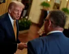 U.S. President Donald Trump speaks to an attendee as he hosts a dinner with Republican members of the U.S. Congress in the East Room of the White House in Washington, D.C., U.S., July 22, 2025. REUTERS/Kent Nishimura/Kent Nishimura