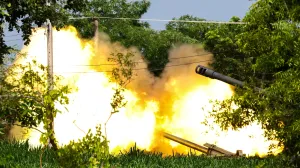 A Thailand's mobile artillery unit fires towards Cambodia's side after Thailand and Cambodia exchanged heavy artillery on Friday as their worst fighting in more than a decade stretched for a second day, in Surin, Thailand, July 25, 2025. REUTERS/Athit Perawongmetha  TPX IMAGES OF THE DAY/Athit Perawongmetha