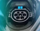 Charging socket of an el asdgadfg adfgasdf agagectric car with blue light/Frimu Eugen