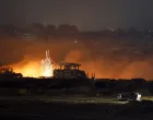 Streaks of light are seen amid smoke and flames resulting from an explosion in Gaza, as seen from the Israeli side of the Israel-Gaza border, July 9, 2025. REUTERS/Amir Cohen   TPX IMAGES OF THE DAY/Amir Cohen
