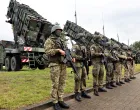 FILE PHOTO: Soldiers stand during Ukrainian President Volodymyr Zelenskiy's visit to a military training area to find out about the training of Ukrainian soldiers on the ?Patriot? anti-aircraft missile system, at an undisclosed location, in Germany, June 11, 2024. Jens Buttner/Pool via REUTERS/File Photo/Jens Buttner