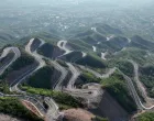 (241129) -- BEIJING, Nov. 29, 2024 (Xinhua) -- An aerial drone photo taken on May 9, 2024 shows a rural road after upgrade in Yuanshi County, Shijiazhuang City, north China's Hebei Province. (Xinhua/Yang Shiyao)/Yang Shiyao