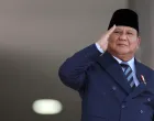 Indonesia's President Prabowo Subianto salutes on the day he meets Brazil's President Luiz Inacio Lula da Silva at Planalto Palace, in Brasilia, Brazil July 9, 2025. REUTERS/Adriano Machado/Adriano Machado