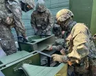 FILE PHOTO: South Korean soldiers work on a loudspeaker that is set up for propaganda broadcasts during a military drill near the demilitarized zone separating the two Koreas in Paju, South Korea, in this handout picture provided by the Defense Ministry and released on June 9, 2024. The Defense Ministry/Handout via REUTERS ATTENTION EDITORS - THIS IMAGE HAS BEEN SUPPLIED BY A THIRD PARTY./File Photo/The Defense Ministry