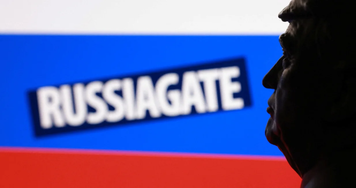 A 3D printed miniature of U.S. President Donald Trump, Russian flag and words "Russiagate" are seen in this illustration taken August 5, 2025. REUTERS/Dado Ruvic/Illustration/Dado Ruvic