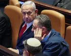 Israeli Prime Minister Benjamin Netanyahu attends a discussion at the plenum in the Knesset, Israel's parliament, in Jerusalem, July 23, 2025. REUTERS/Ronen Zvulun/Ronen Zvulun
