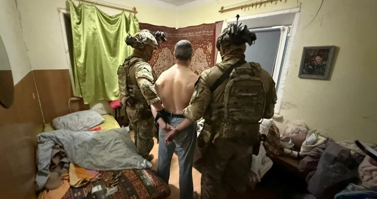 A suspect in the murder of former Ukrainian parliamentary speaker Andriy Parubiy, who was killed on Saturday, is detained by police, amid Russia's attack on Ukraine, in an unknown location in Ukraine, in this handout picture released September 1, 2025. Press service of the National Police of Ukraine/Handout via REUTERS ATTENTION EDITORS - THIS IMAGE HAS BEEN SUPPLIED BY A THIRD PARTY. DO NOT OBSCURE LOGO. TPX IMAGES OF THE DAY/National Police Of Ukraine