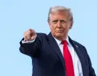 U.S. President Donald Trump gestures, while he boards Air Force One, as he departs for New York at Joint Base Andrews, Maryland, U.S., September 11, 2025. REUTERS/Ken Cedeno  TPX IMAGES OF THE DAY/Ken Cedeno