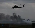 U.S. Apache military helicopter flies as Polish forces with NATO soldiers hold 'Iron Defender' military exercises, at a military range in Wierzbiny near Orzysz, Poland, September17, 2025. REUTERS/Kacper Pempel/Kacper Pempel