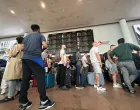 Travellers wait in queues at Brussels airport, after a cyberattack at a service provider for check-in and boarding systems disrupted operations at several major European airports, in Zaventem near Brussels, Belgium September 20, 2025. REUTERS/Marta Fiorin/Marta Fiorin