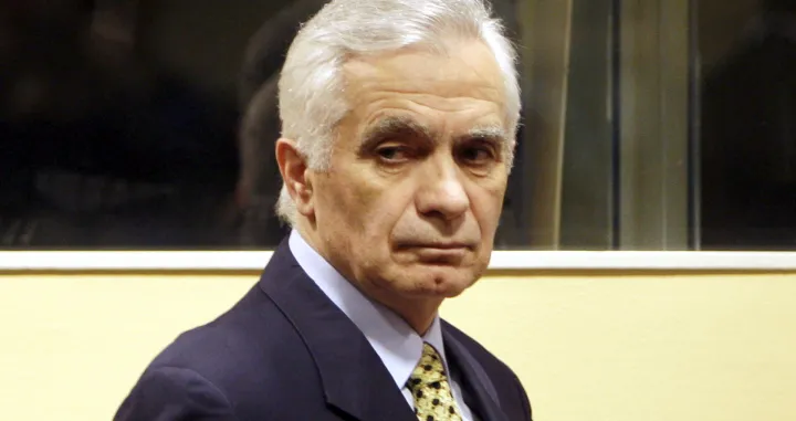 epa08669659 (FILE) - The former speaker of the Bosnian Serb parliament Momcilo Krajisnik enters the courtroom for his appeals verdict at the courtroom of the U.N. Yugoslav war crimes tribunal in the Hague, Netherlands, 17 March 2009 (reissued 15 September 2020). University Clinical Centre in Banja Luka, Bosnia Herzegovina said 15 September 2020 Momcilo Krajisnik, a Bosnian Serb political leader, died of infection with the novel coronavirus at the clinic in Banja Luka, Bosnia Herzegovina. Krajisnik was found guilty in 2006 of committing crimes against humanity during the Bosnian War by the International Criminal Tribunal for the former Yugoslavia (ICTY) and was sentenced to 20 years' imprisonment. He was 01 September 2013 granted early release after serving two thirds of the sentence. EPA/BAS CZERWINSKI/ POOL/Bas Czerwinski/ Pool