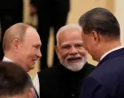 FILE PHOTO: Indian Prime Minister Narendra Modi talks with Russian President Vladimir Putin and Chinese President Xi Jinping ahead of the Shanghai Cooperation Organization (SCO) Summit 2025 at the Meijiang Convention and Exhibition Centre in Tianjin, China, September 1, 2025. SUO TAKEKUMA/Pool via REUTERS/File Photo/Suo Takekuma