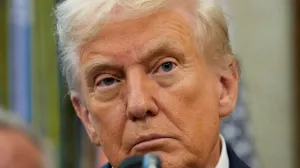 FILE PHOTO: U.S. President Donald Trump looks on as he announces a deal with Pfizer to sell drugs at lower prices, in the Oval office of the White House in Washington, D.C., U.S., September 30, 2025. REUTERS/Ken Cedeno/File Photo/Ken Cedeno