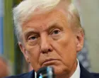 FILE PHOTO: U.S. President Donald Trump looks on as he announces a deal with Pfizer to sell drugs at lower prices, in the Oval office of the White House in Washington, D.C., U.S., September 30, 2025. REUTERS/Ken Cedeno/File Photo/Ken Cedeno