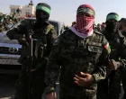 FILE PHOTO: Abu Ubaida, the spokesman of the Izz el-Deen al-Qassam Brigades, walks during an anti-Israel military show by Hamas militants in the southern Gaza Strip November 11, 2019. REUTERS/Ibraheem Abu Mustafa/File Photo/Ibraheem Abu Mustafa