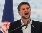 FILE PHOTO: Israeli Finance Minister Bezalel Smotrich speaks at a press conference regarding settlements expansion for the long-frozen E1 settlement, that would split East Jerusalem from the occupied West Bank, near the Israeli settlement of Maale Adumim in the Israeli-occupied West Bank, August 14, 2025. REUTERS/Ronen Zvulun/File Photo/Ronen Zvulun